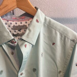 Short Sleeve Soft Pastel Green Woven w/toucan, watermelon palm embroidery.